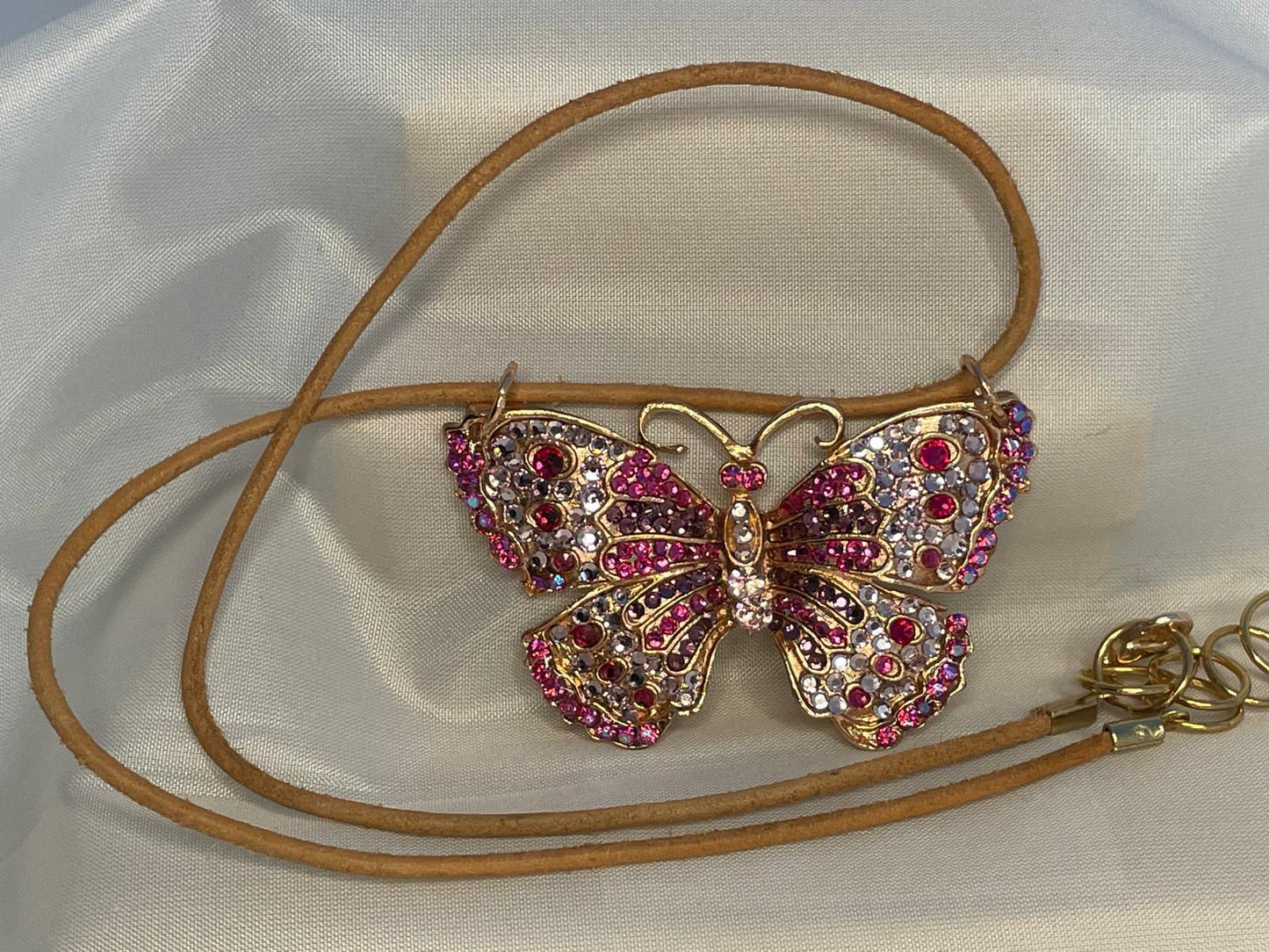 Butterfly necklace on leather choker